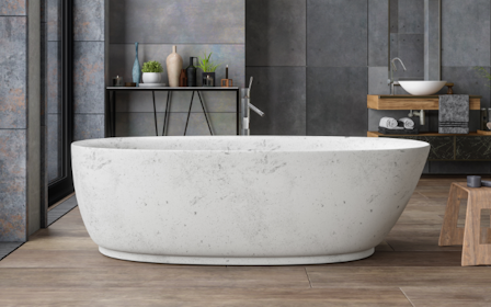 A bathtub in a bathroom.