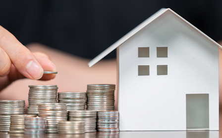 A person holding a card.