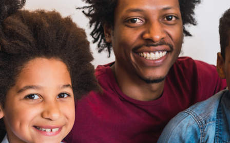 A group of people smiling.