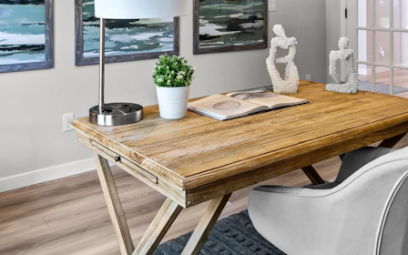 A table and chairs in a room.