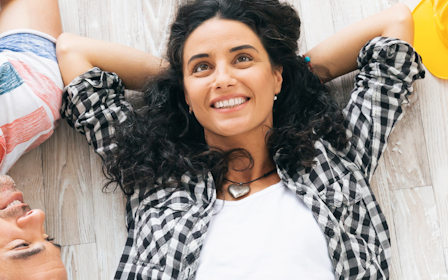 A person lying on a person's chest.