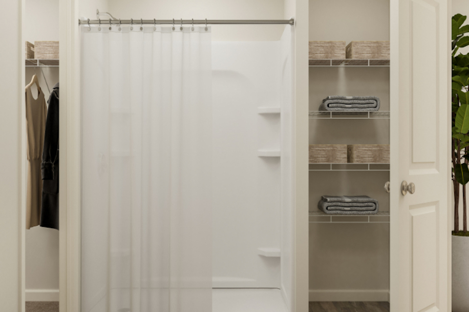 A closet with a white curtain.