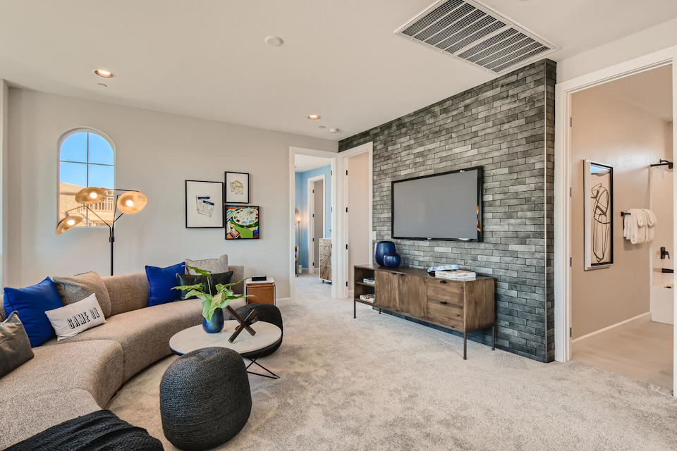 A living room with a fireplace.