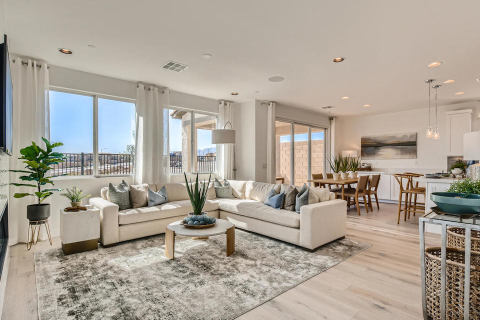A living room with a large window.