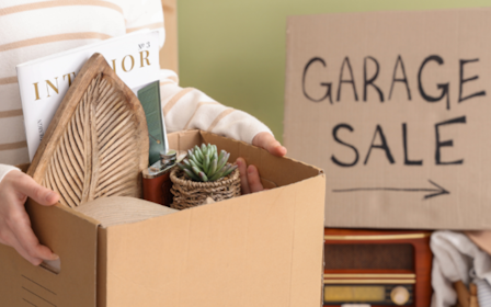 A person holding a sign.