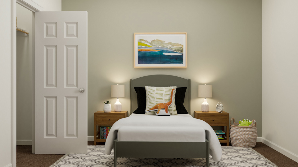 A bedroom with a bed and lamps.