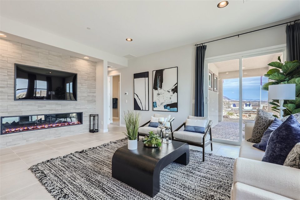 A living room with a fireplace.