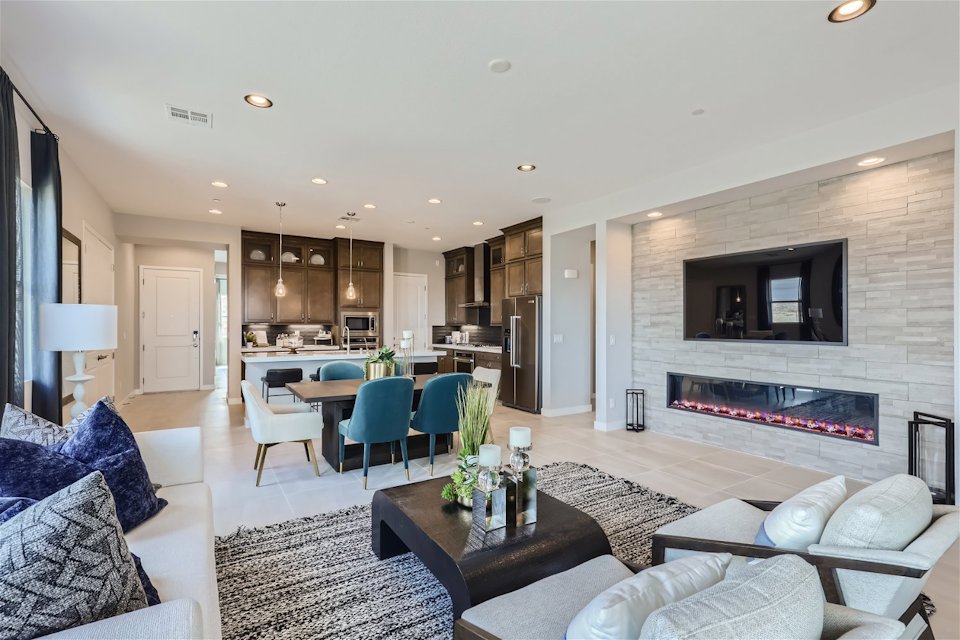 A living room with a fireplace.