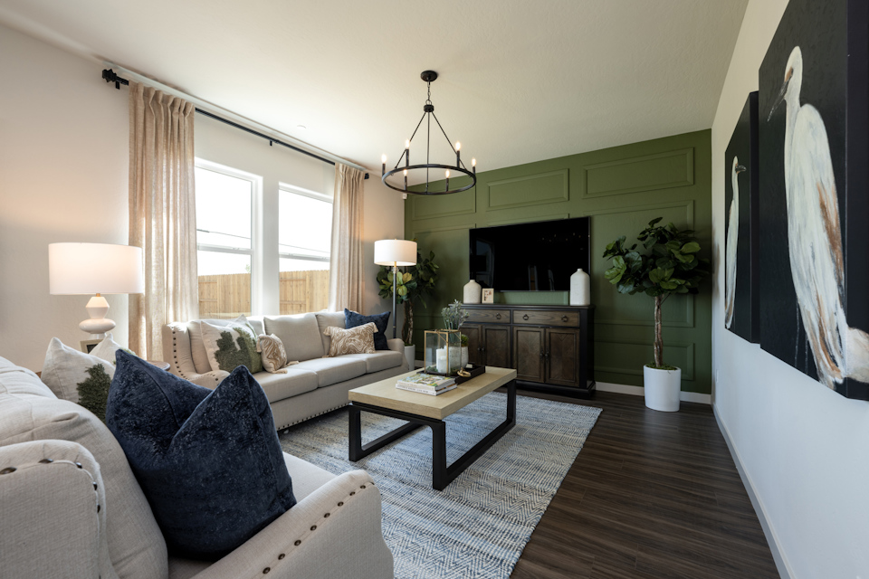 A living room with a large window.