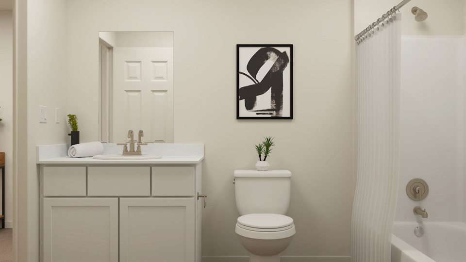 A bathroom with a toilet and sink.