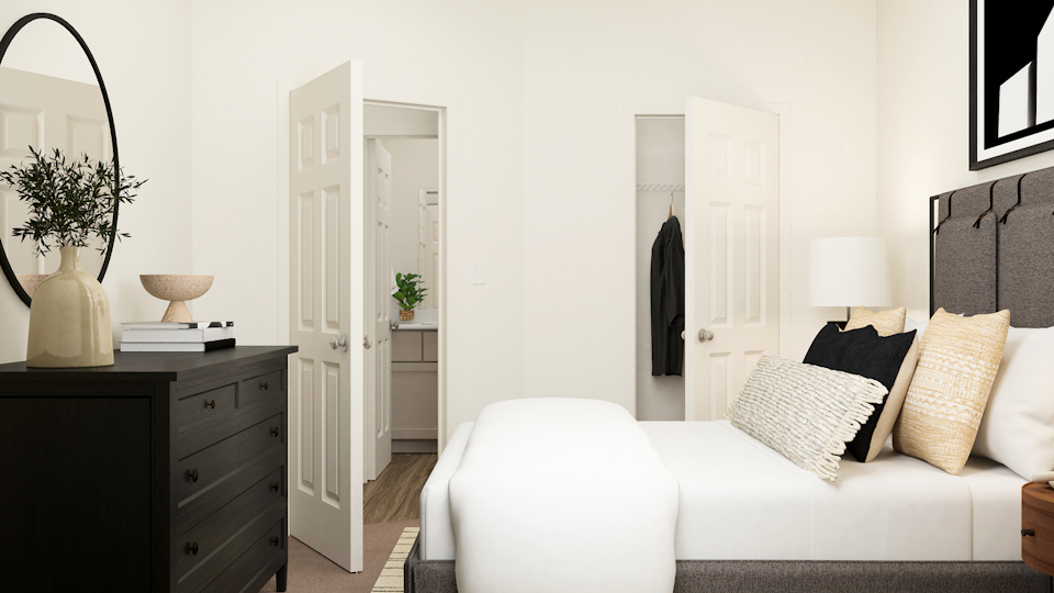 A room with white furniture.