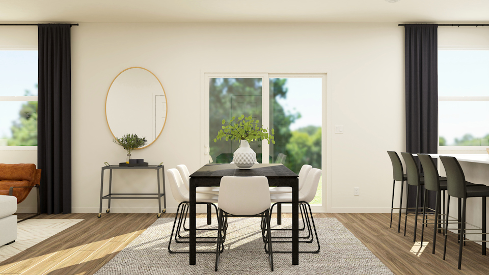 A room with a table and chairs.