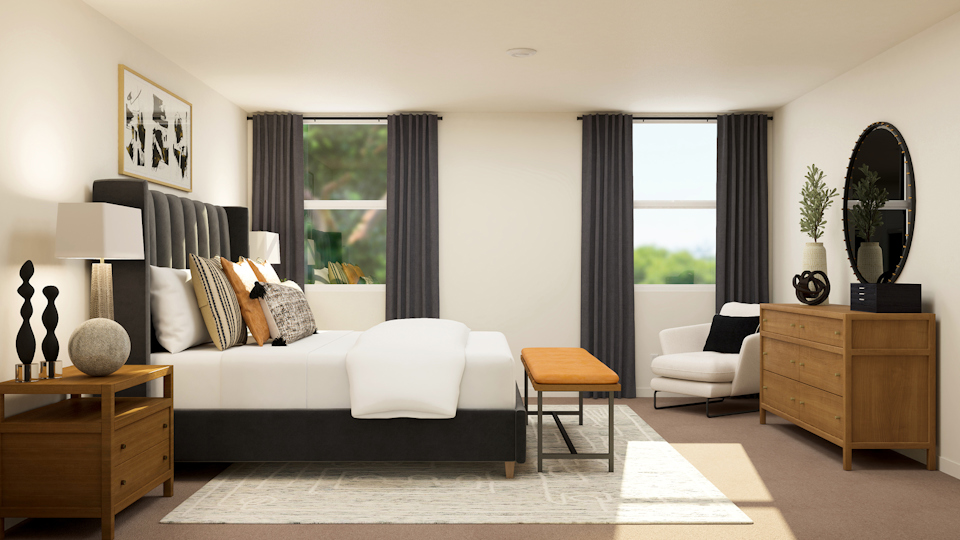 A living room with a couch and a table.