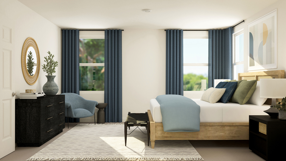 A room with a couch and a table.