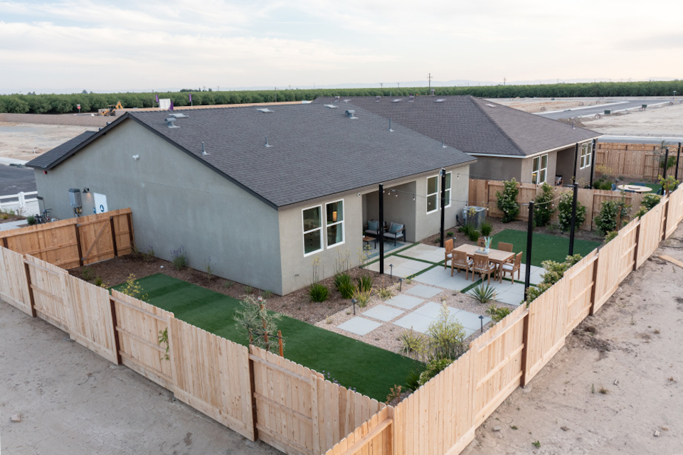 A house with a fence around it.