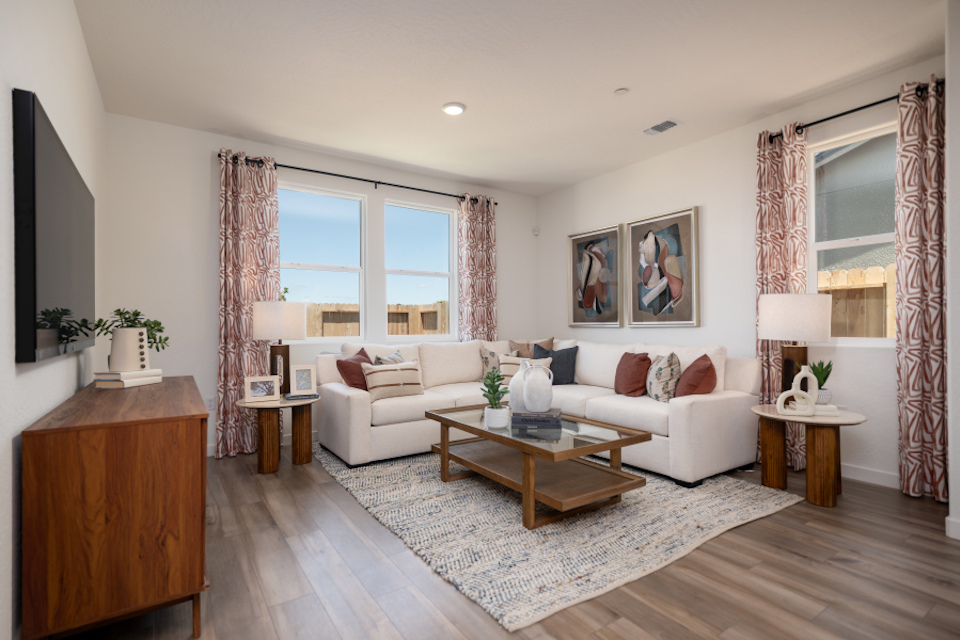 A living room with a large window.