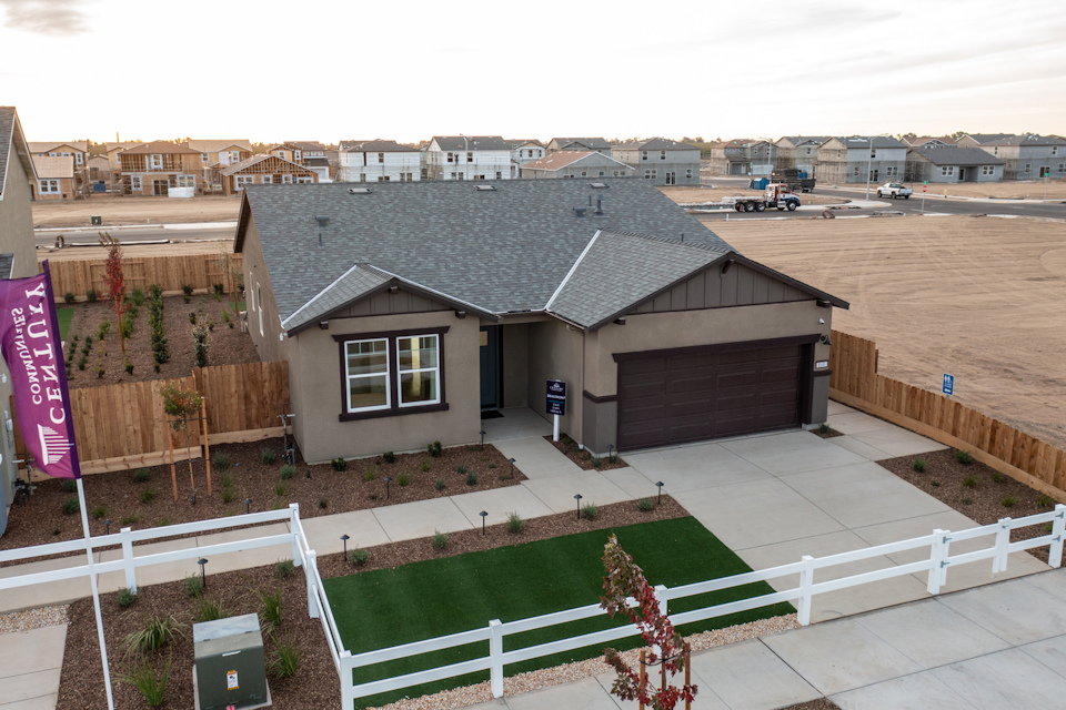 A house with a fence around it.