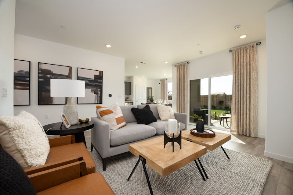 A living room with a large window.