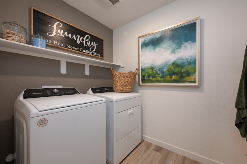 A laundry room with a washer and dryer.