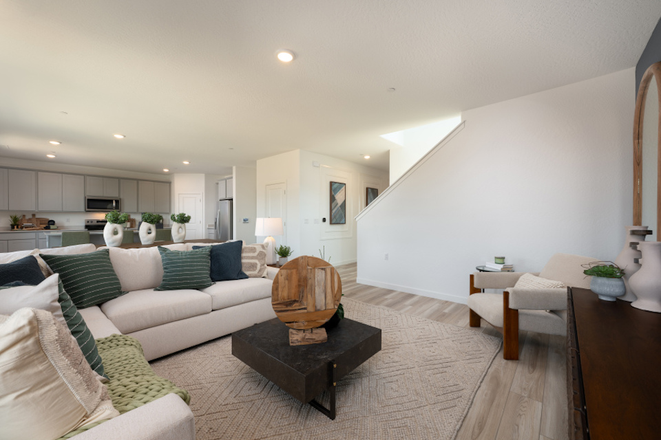 A living room with a couch and a coffee table.