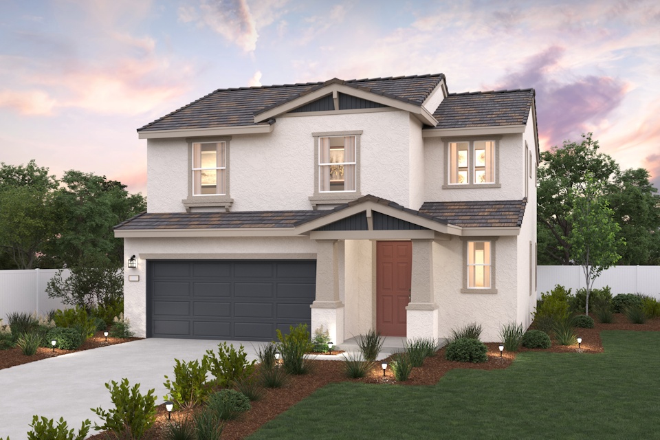 A white house with a garage.