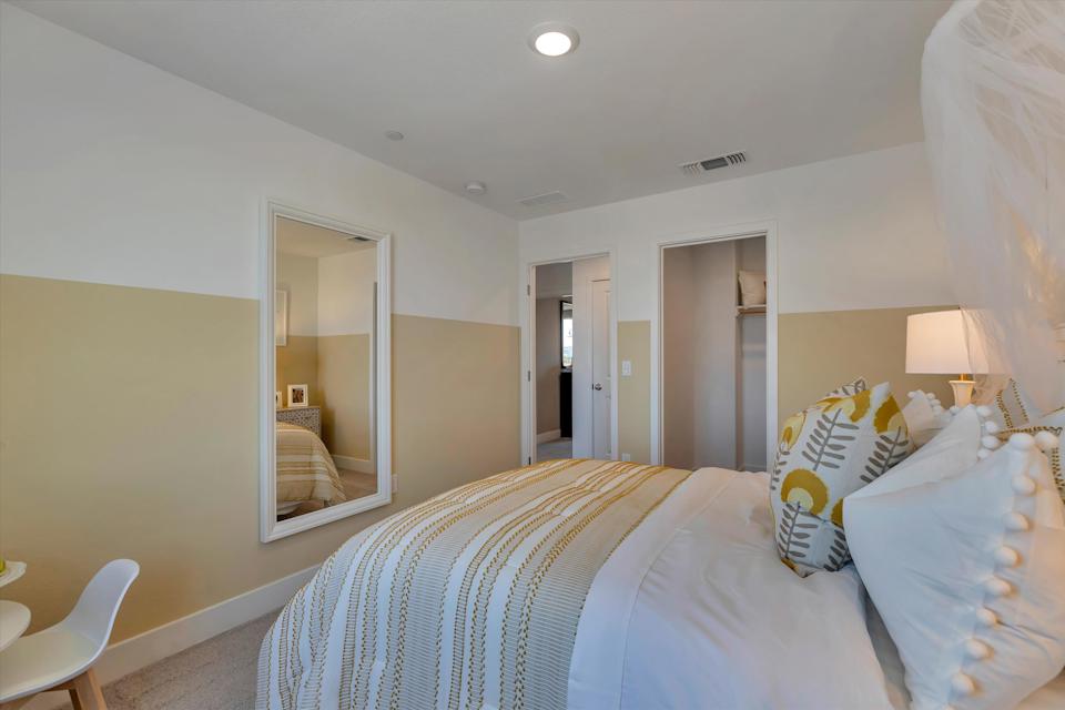 A hotel room with two beds.