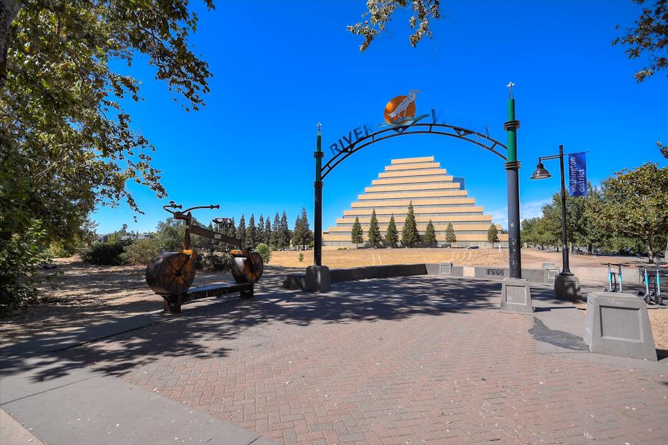 A large sculpture in a park.