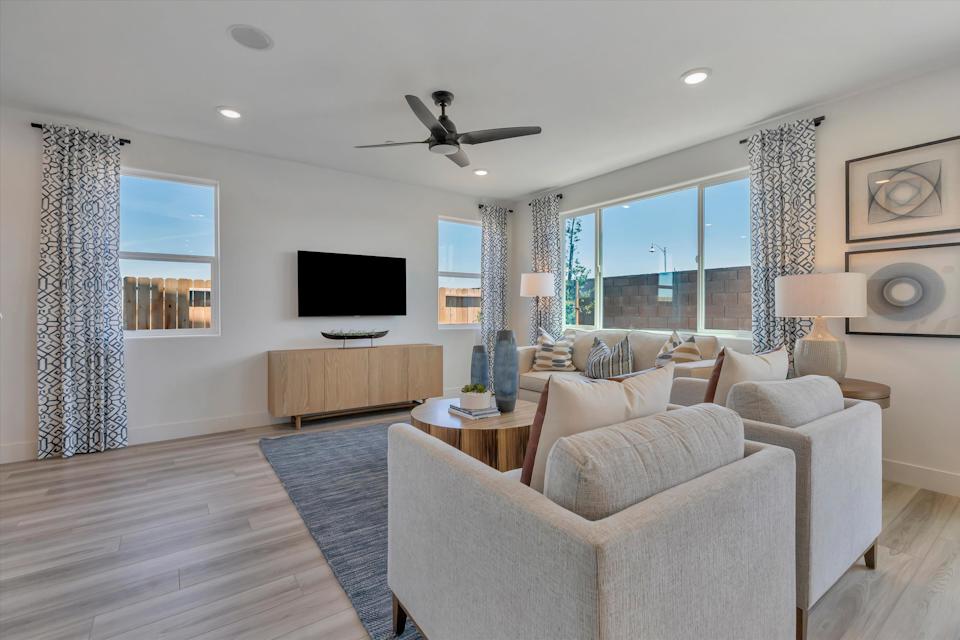 A living room with a large window.