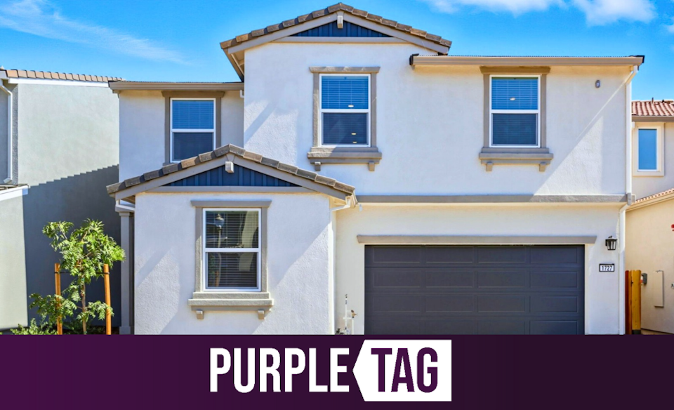 A building with a garage.