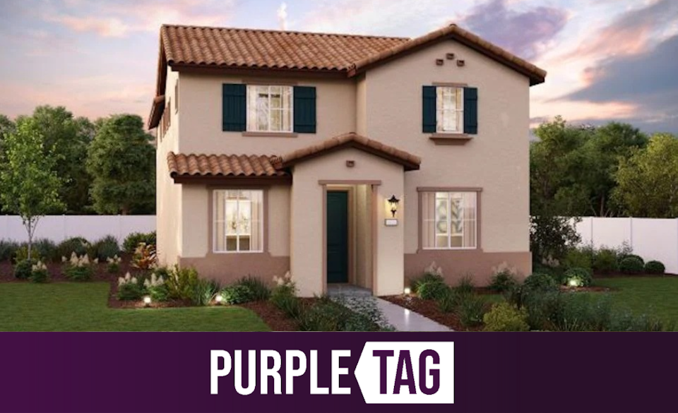 A house with a large front yard.