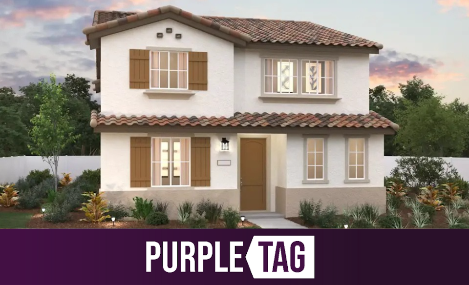 A house with a large front yard.