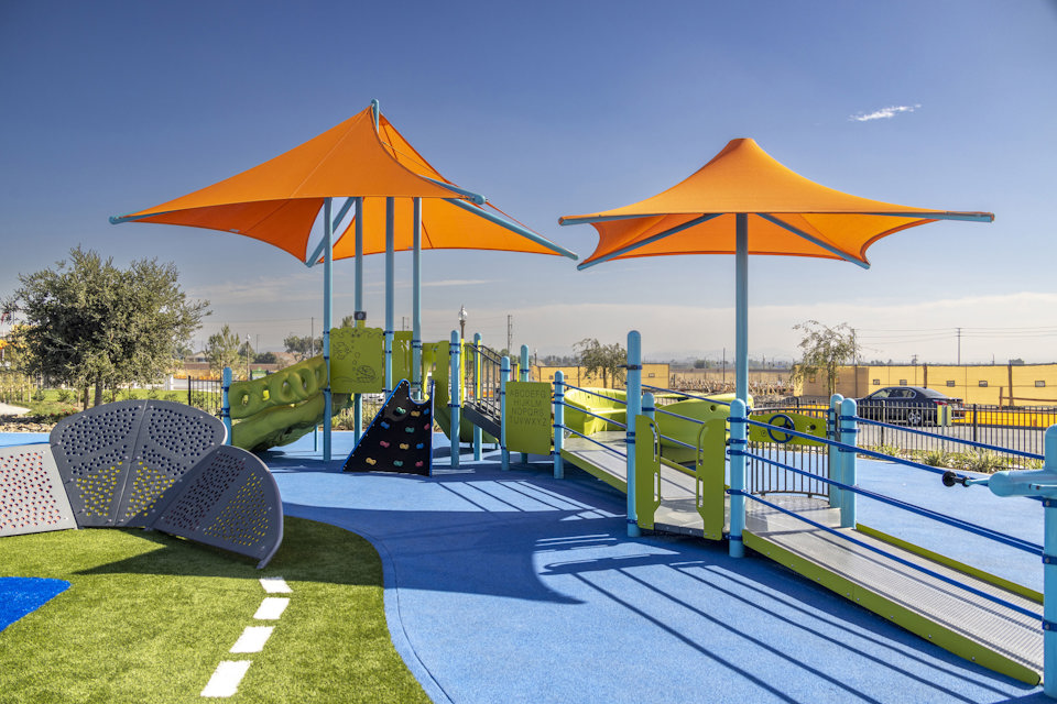 A swimming pool with umbrellas.