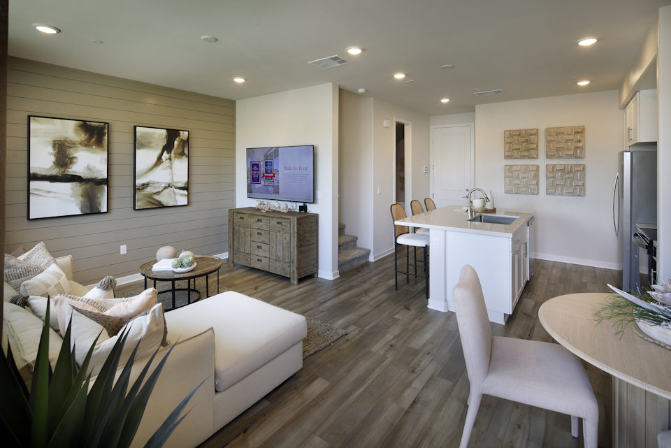 A living room with a tv and couches.