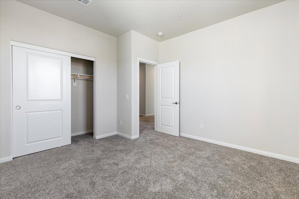 A room with white doors.
