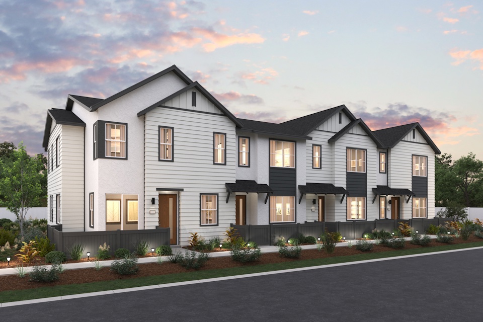 A large house with a driveway.