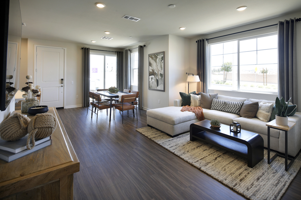 A living room with a large window.