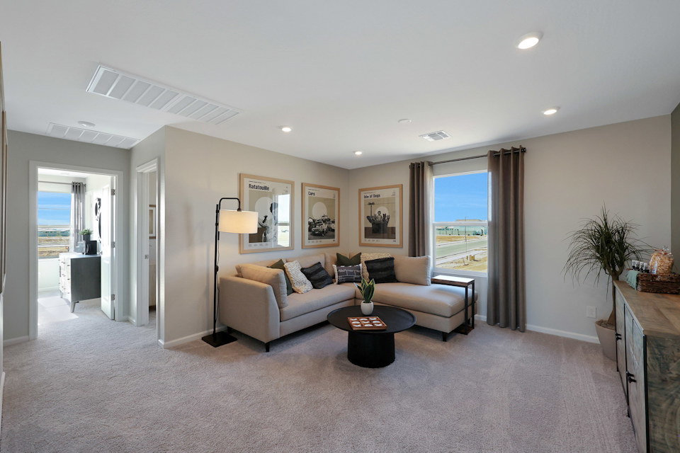 A living room with a couch and a coffee table.