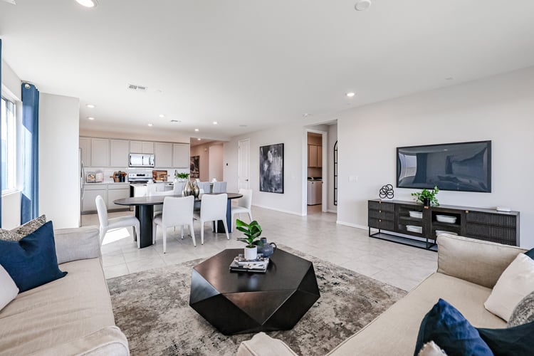 A living room with a tv and couches.