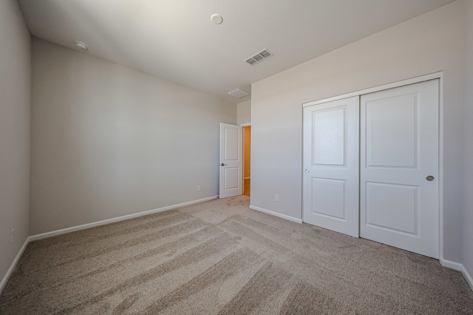 A room with white doors.