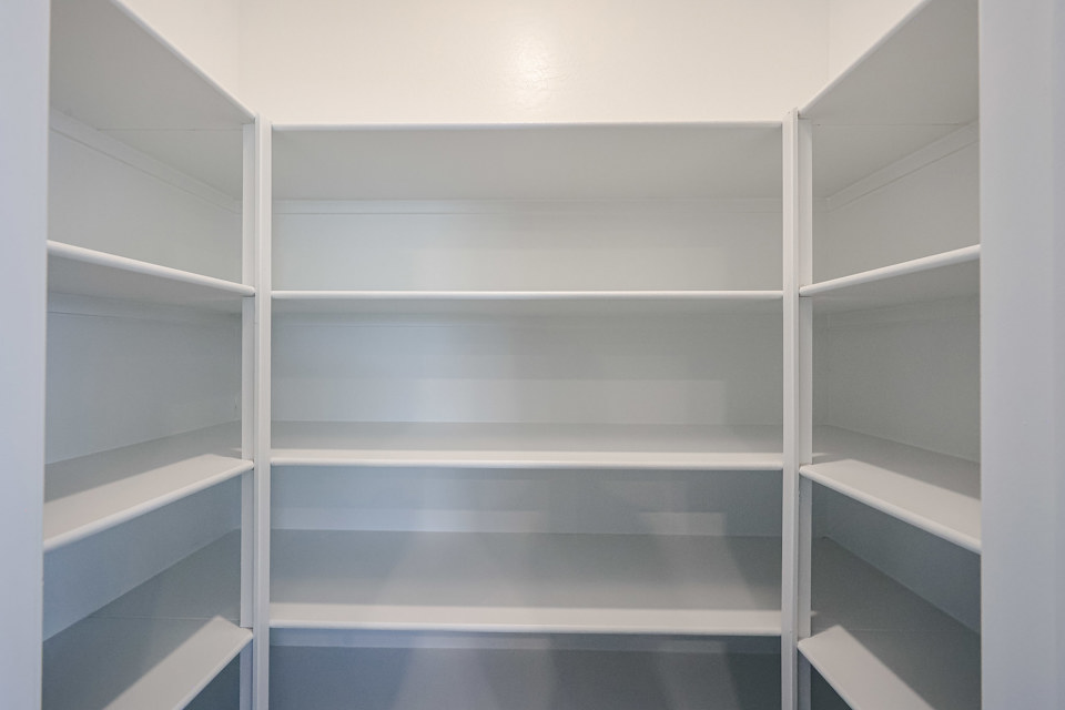 A white shelf with white shelves.