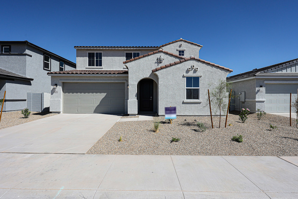 A house with a driveway.