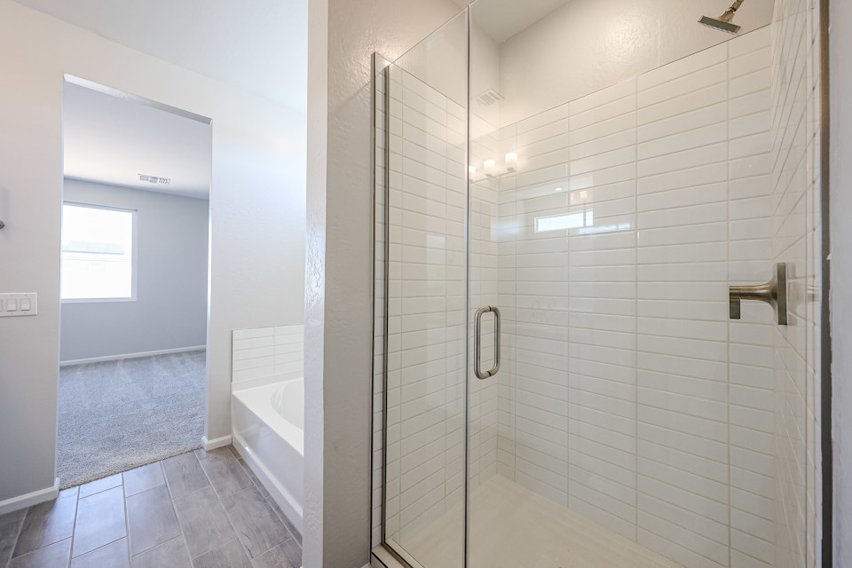 A bathroom with a glass shower.