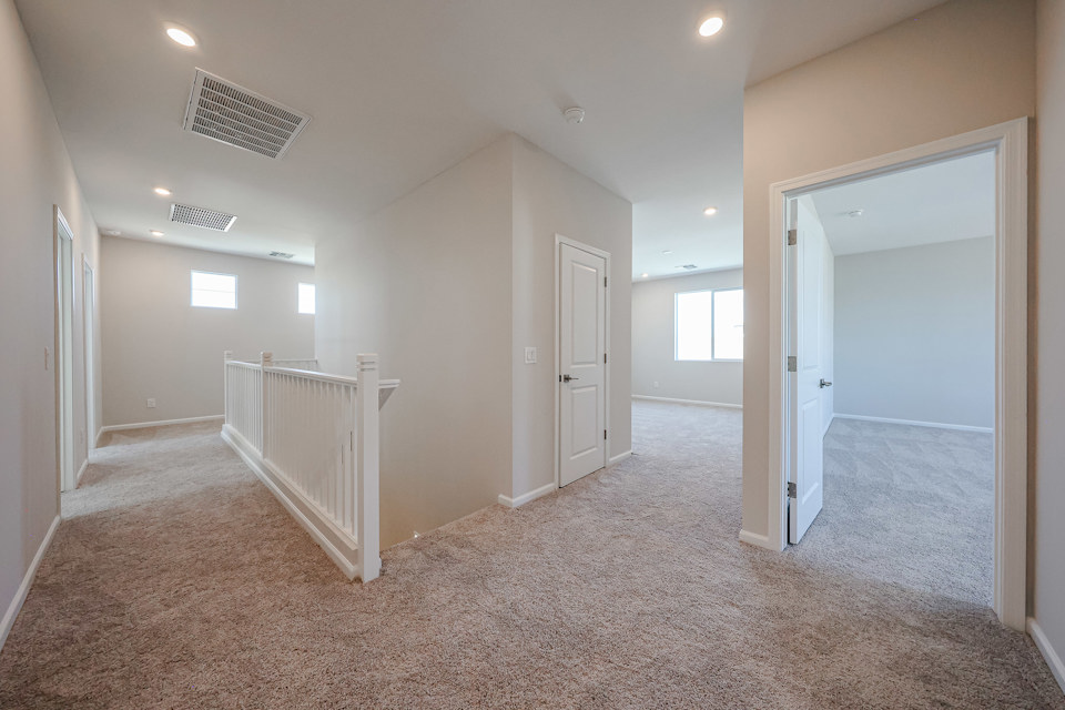 A room with white doors.