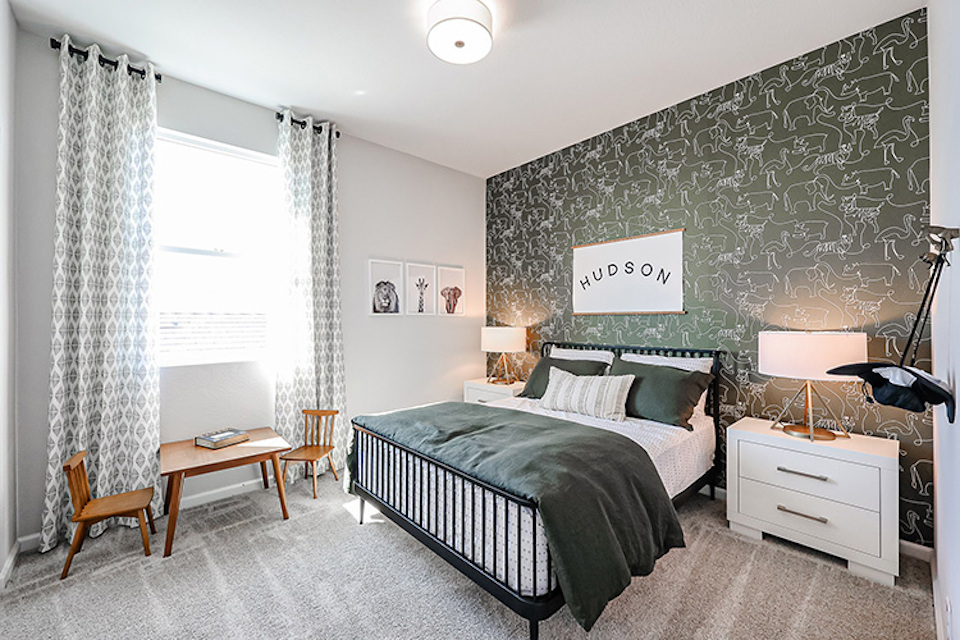 A bedroom with two beds.