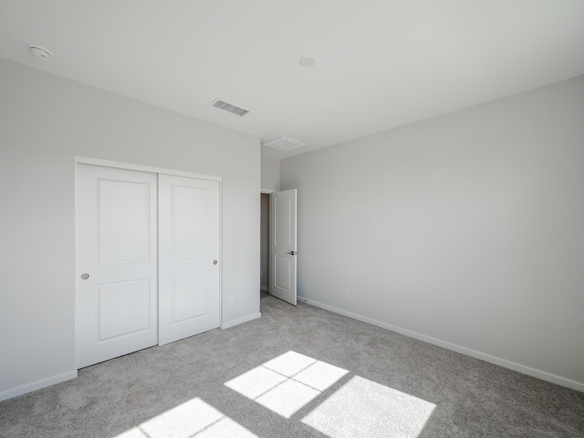 A room with white doors.