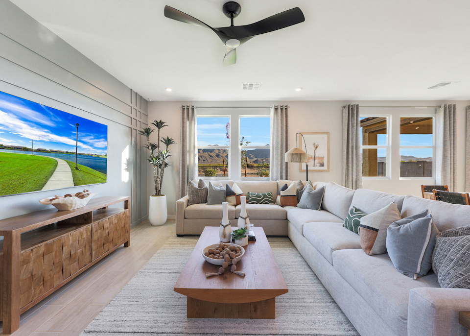 A living room with a large window.