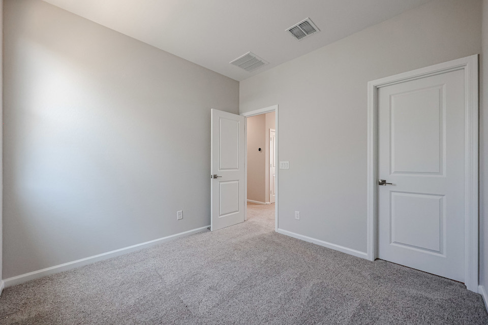 A room with white doors.