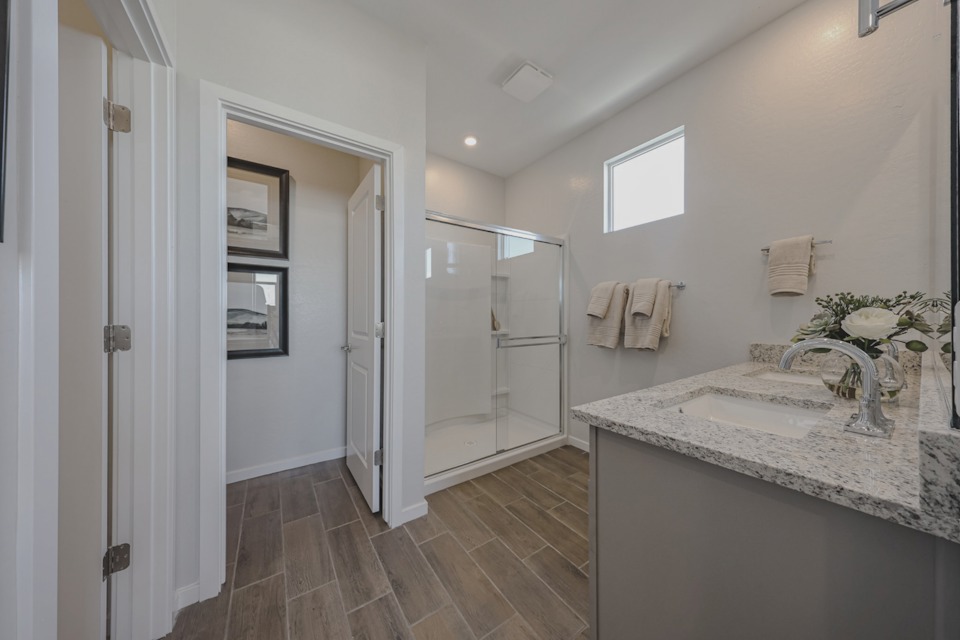 A bathroom with a glass shower.