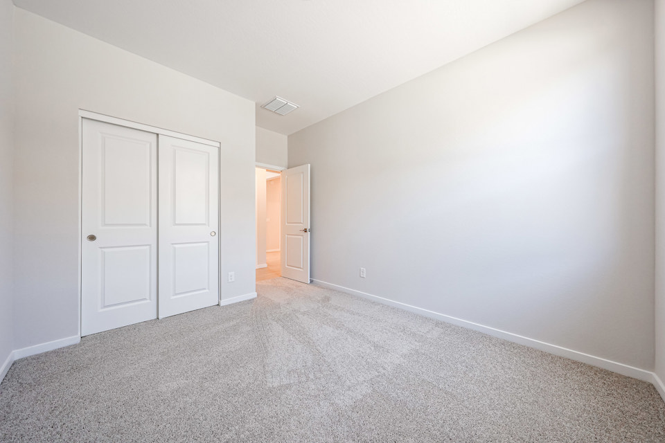 A room with white doors.