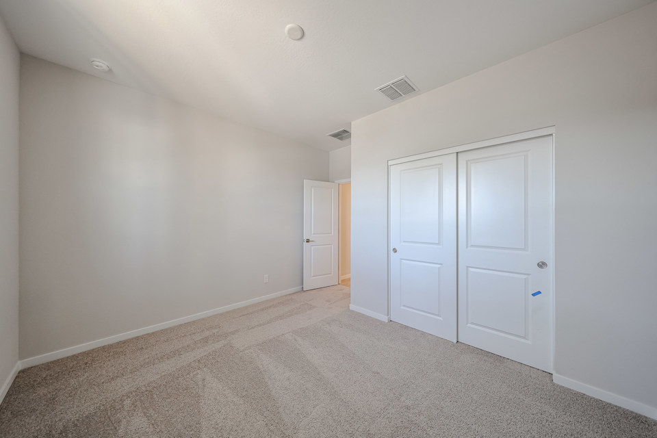 A room with white doors.